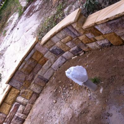 Sandstone ballast circular wall