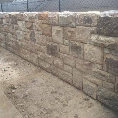  Sandstone wall built out of hand crafted sandstone blocks