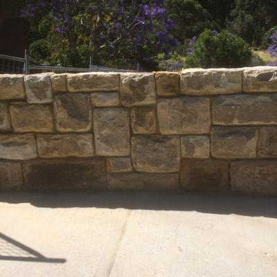 Rebuilt recycled sandstone  wall