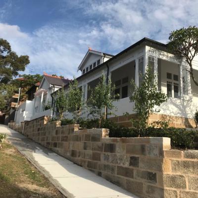 Rebuilt heritage sandstone retaining wall