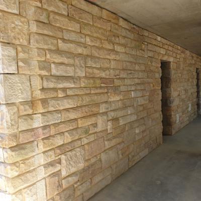 Heritage sandstone rock faced wall rebuilt 