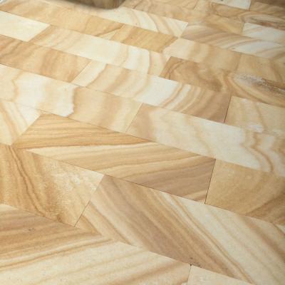 Medium brown sandstone paving